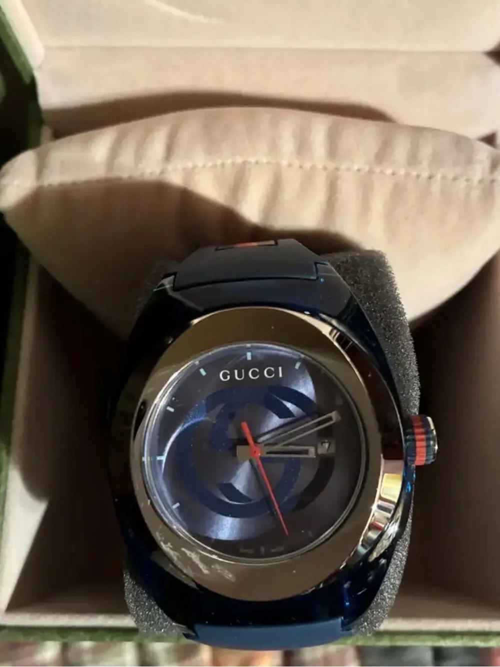Gucci Men’s Blue Dial Watch with Gold Bezel and Red Accent